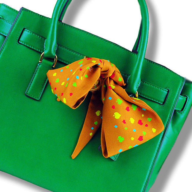 brown & multicolor monaco silk twilly 39x4" by ANNE TOURAINE Paris™ – styled in the hair
