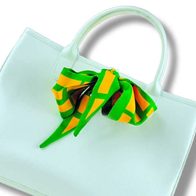 green & orange cannes silk twilly 39x4" by ANNE TOURAINE Paris™ – styled in the hair