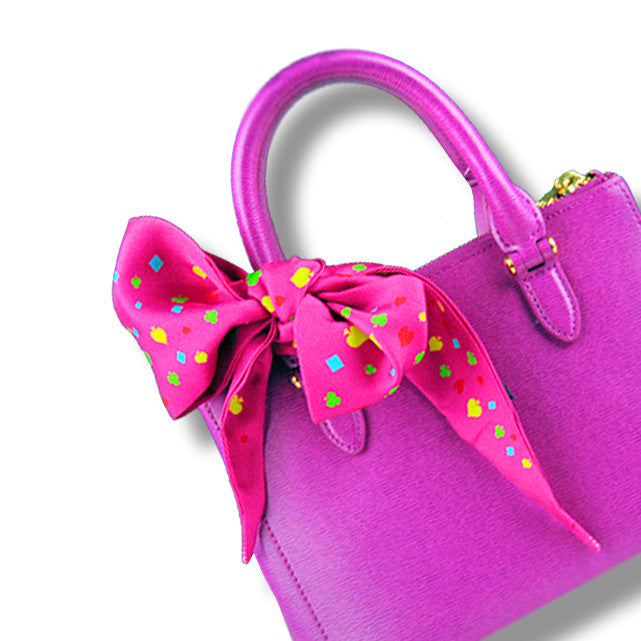 pink & multicolor monaco silk twilly 39x4" by ANNE TOURAINE Paris™ – styled in the hair