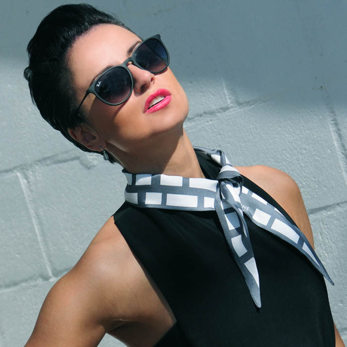 grey & white cannes silk twilly 39x4" by ANNE TOURAINE Paris™ – styled in the hair