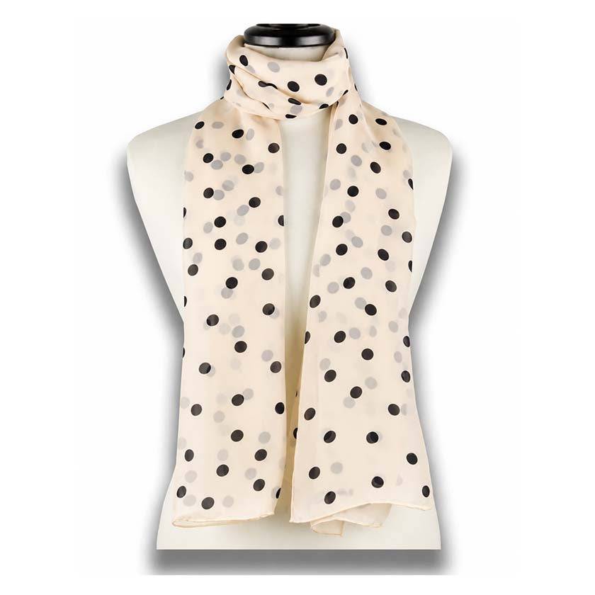 A lightweight beige silk chiffon stole with black polka dots by Anne Touraine Paris, draped on a white mannequin torso against a white background.