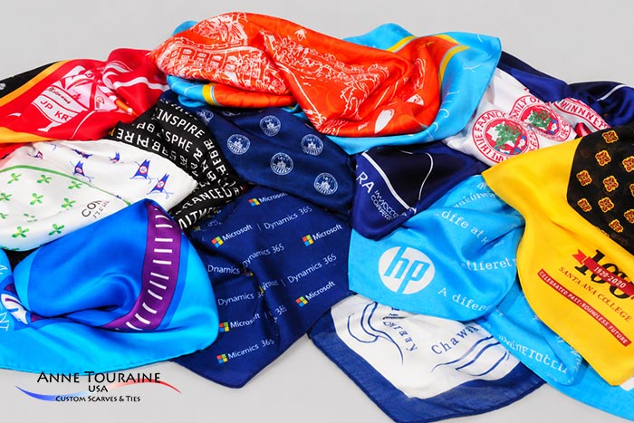 showing different fabrics (silk, polyester, modal, silk-cotton) from which anne touraine usa manufactured custom printed logoed and designe scarves