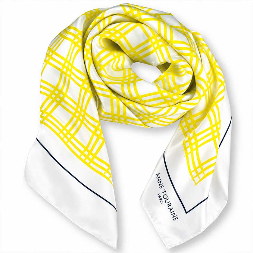 loose knot presentation of a yellow Street Chic X Large ilk satin scarf by Anne Touraine Paris, shown on a clean white background.