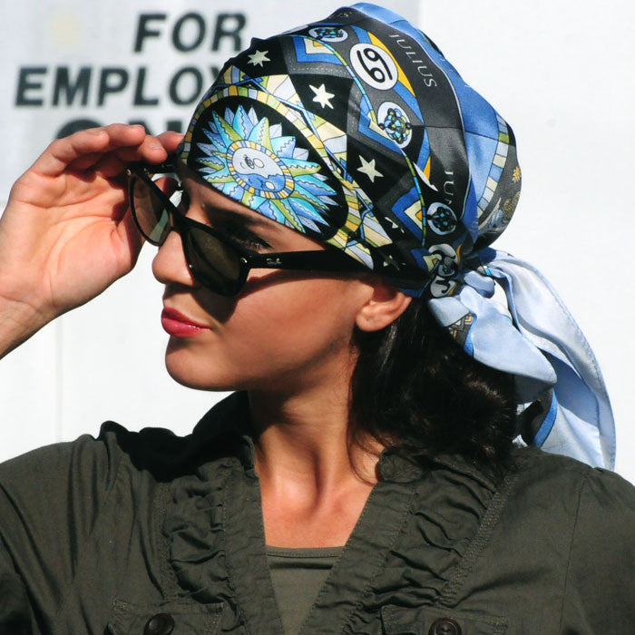Astrology blue scarf featuring the twelve zodiac signs  by ANNE TOURAINE Paris™ scarves tied pirate style