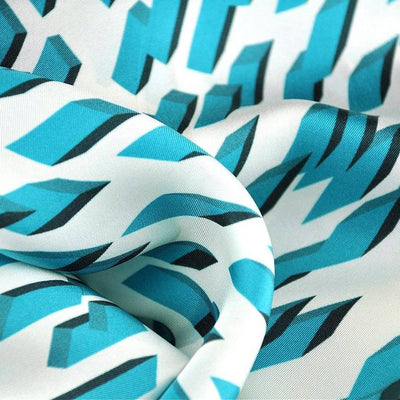 Teal and white silk twill scarf with geometrical design. Made in France. Size 27x27". Hand rolled hem. Scarf by ANNE TOURAINE Paris™ (6)