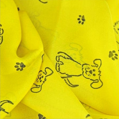 Yellow silk chiffon scarf with dog pattern, oblong shape: a perfect gift for dog lovers. Scarf by ANNE TOURAINE Paris™ (4)