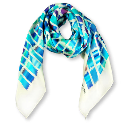 Turquoise and navy blue extra large silk scarf with a contemporary ethnic pattern: versatile and easy to wear all year round. Scarf ANNE TOURAINE Paris™ (1)